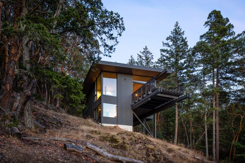 Image of Buck Mountain Cabin perched on the sloping terrain
