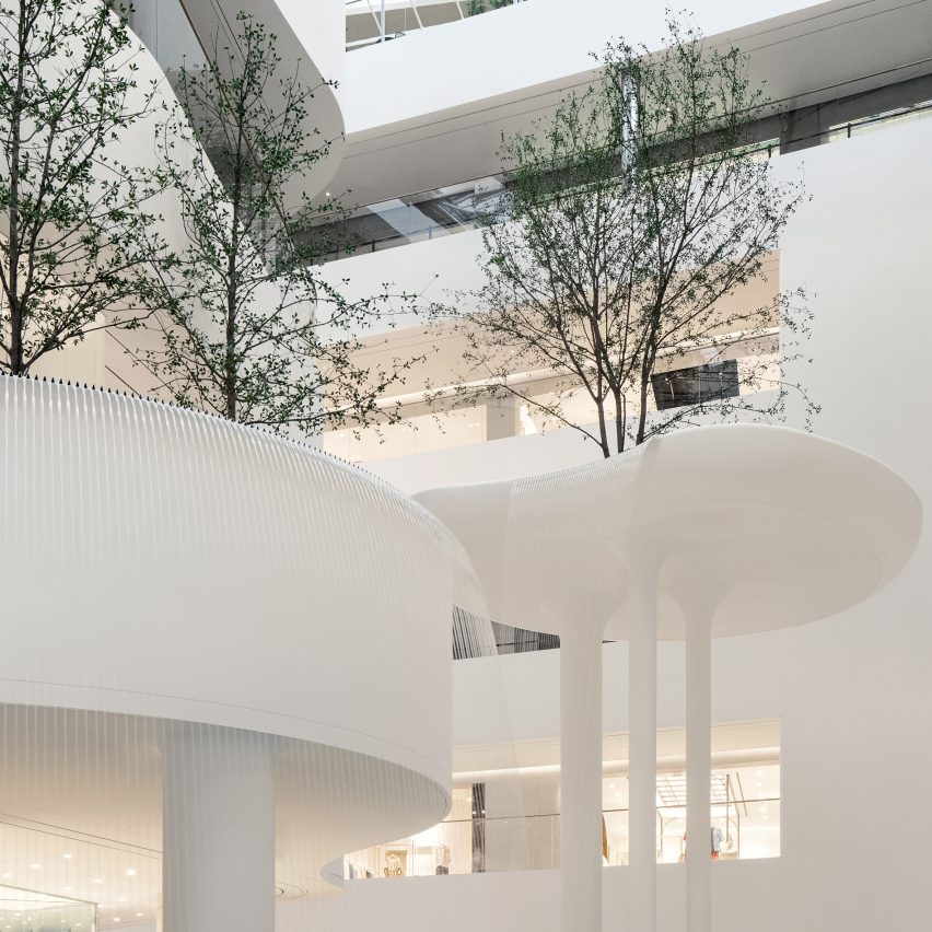 Platforms with trees and waterfalls in Hyundai Seoul mall by Burdifilek