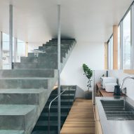 KAPPA House by Archipelago Architects Studio uses staircases as surfaces and partitions