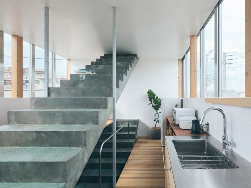 KAPPA House by Archipelago Architects Studio uses staircases as surfaces and partitions