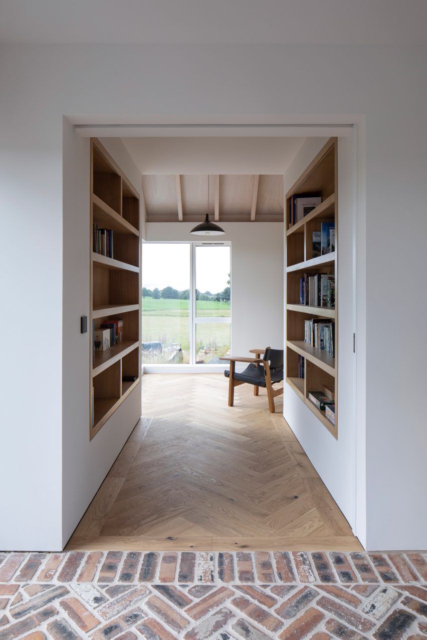 Interior image of a book-lined corridor