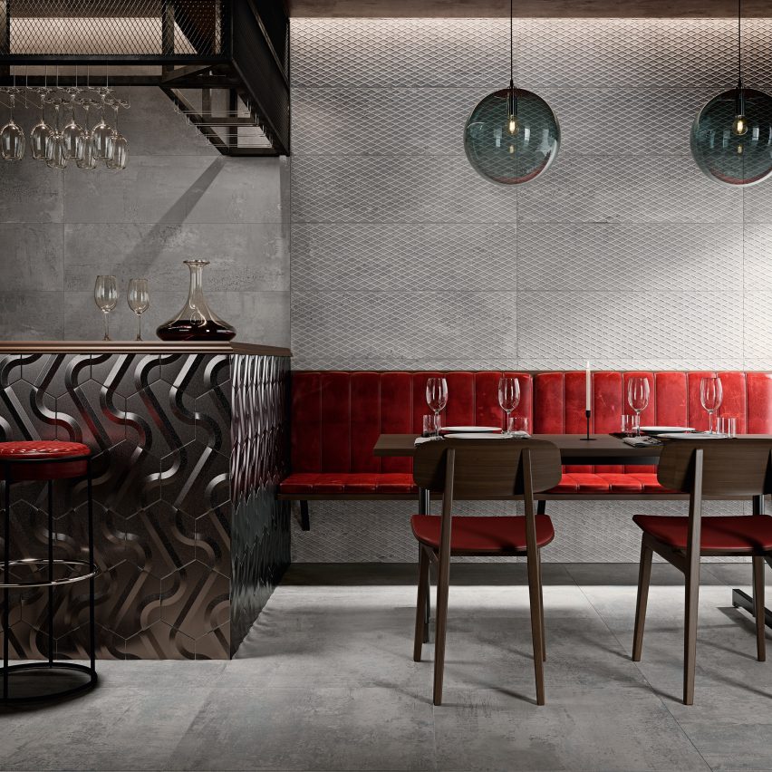Metallic tiles by Aparici in grey used on the floor and walls of a bar