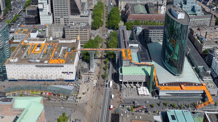 Orange covers the 600 metre elevated walkway in Rotterdam by MVRDV
