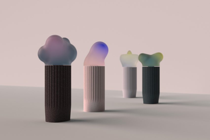 Rendering of four differently shaped capsules on top of cylindrical spacer mouthpieces