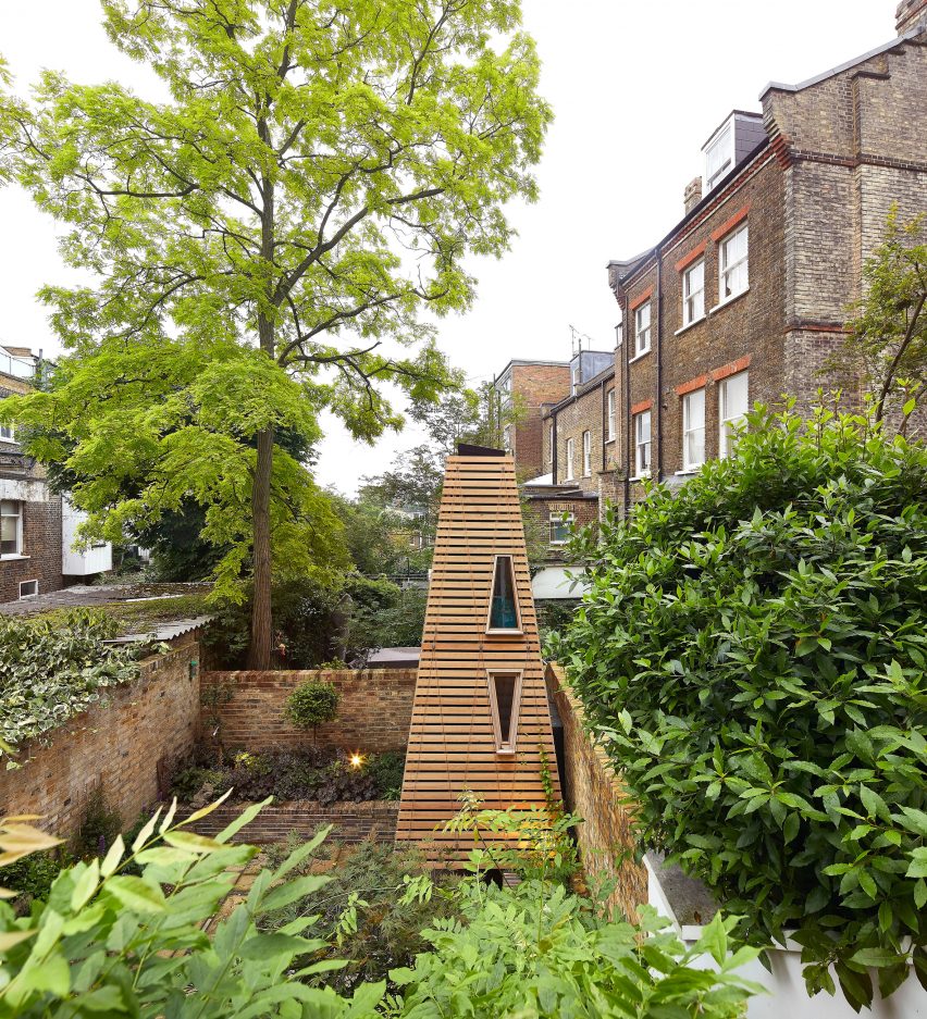 Timber playhouse in London garden