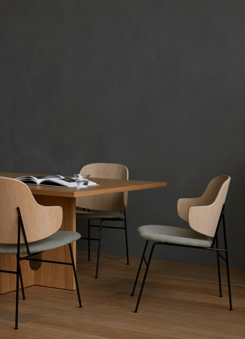 Three Penguin Dining Chairs arranged around a table