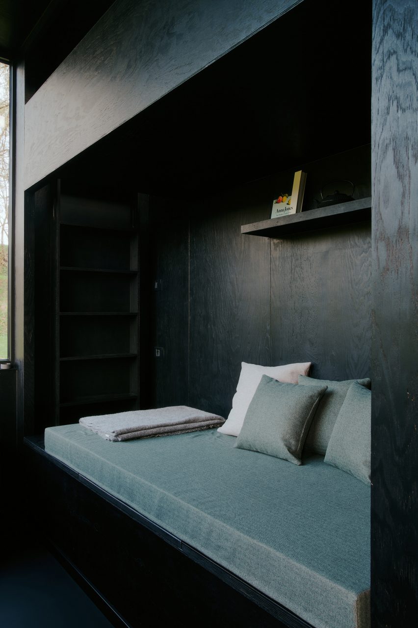 Sofa niche in black cabin
