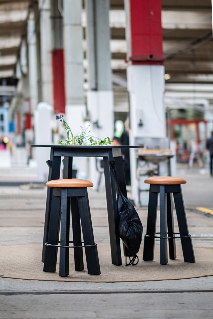 Two stools and a table made from waste materials