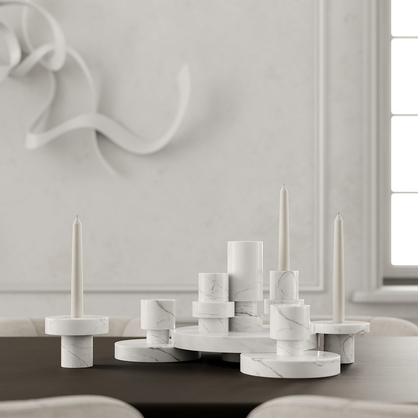 White marble Rotonda candle holder on a dark wooden table
