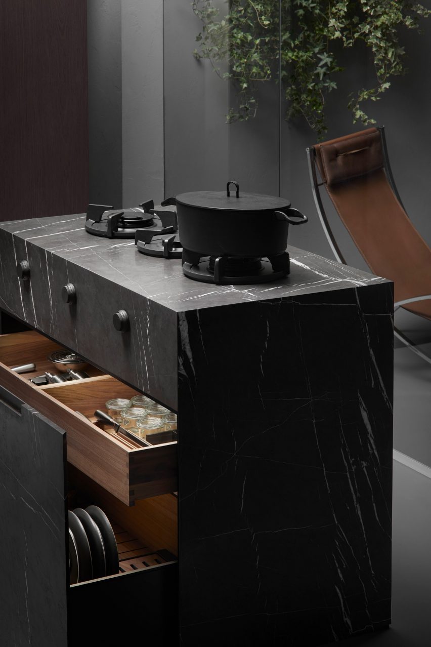 A picture of the marbled Small Living Kitchens islands by Falper