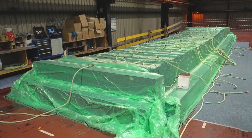 Flax composite blocks covered in plastic sheeting for the vacuum infusion process 