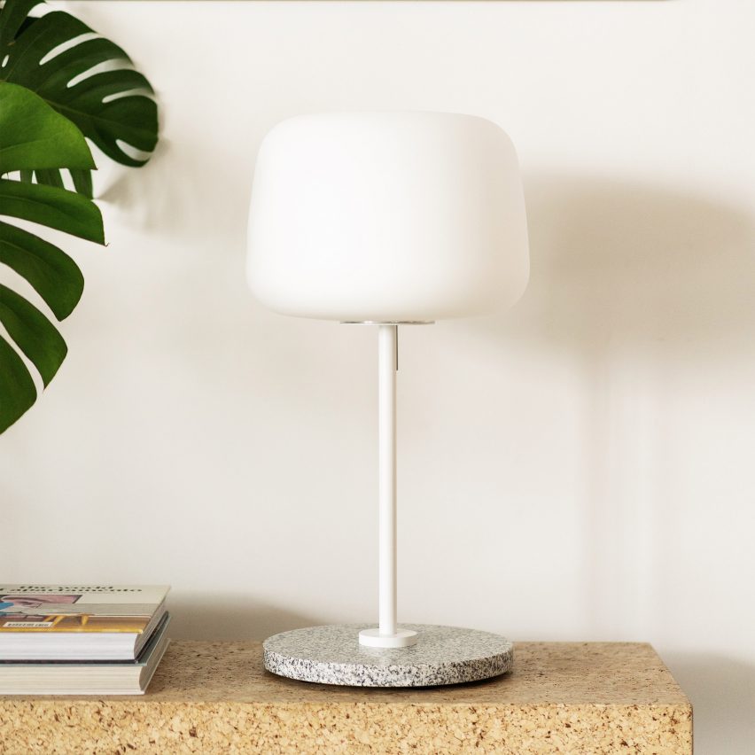 Soft table lamp on a wooden shelf