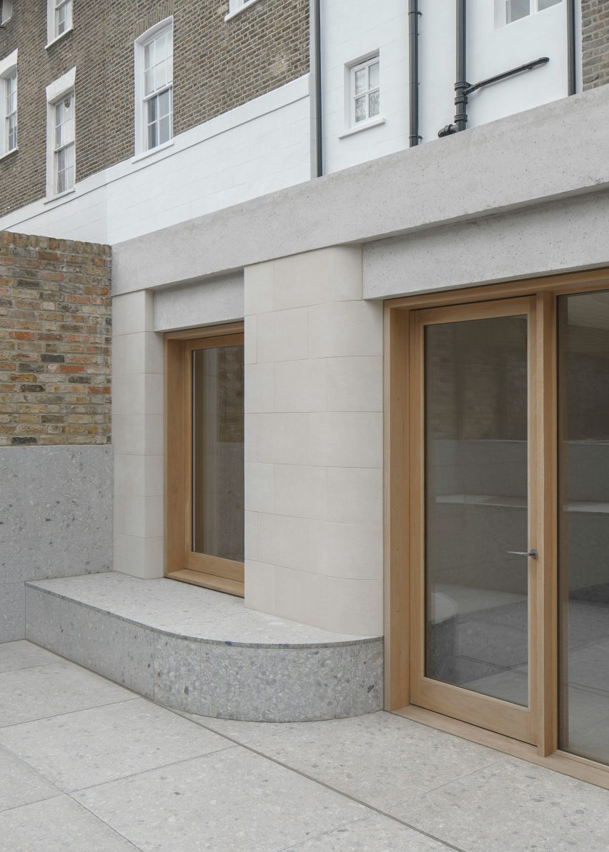 Rear extension made from stone, concrete and wood