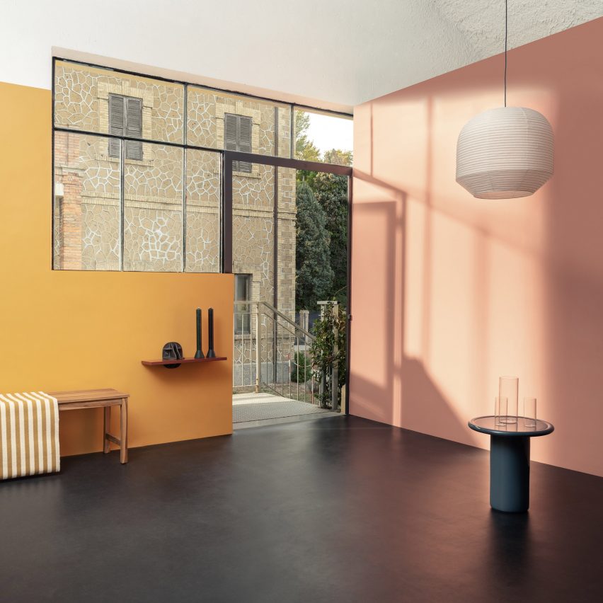 Pink and yellow Linoleum covers the walls of an interior