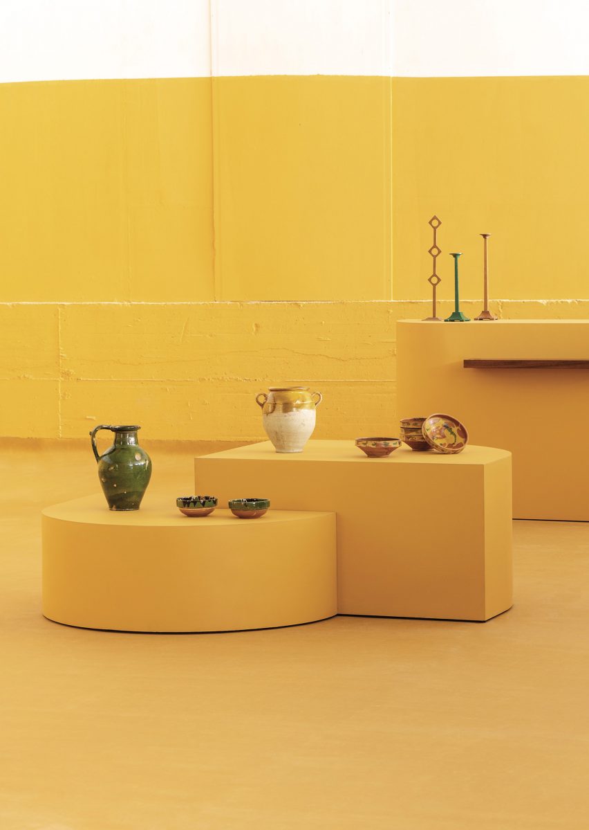 Bright yellow Tarkett Lino covers plinths and display areas