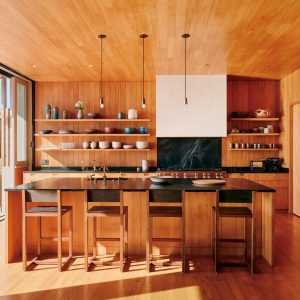 Wood-clad kitchen in Surf House