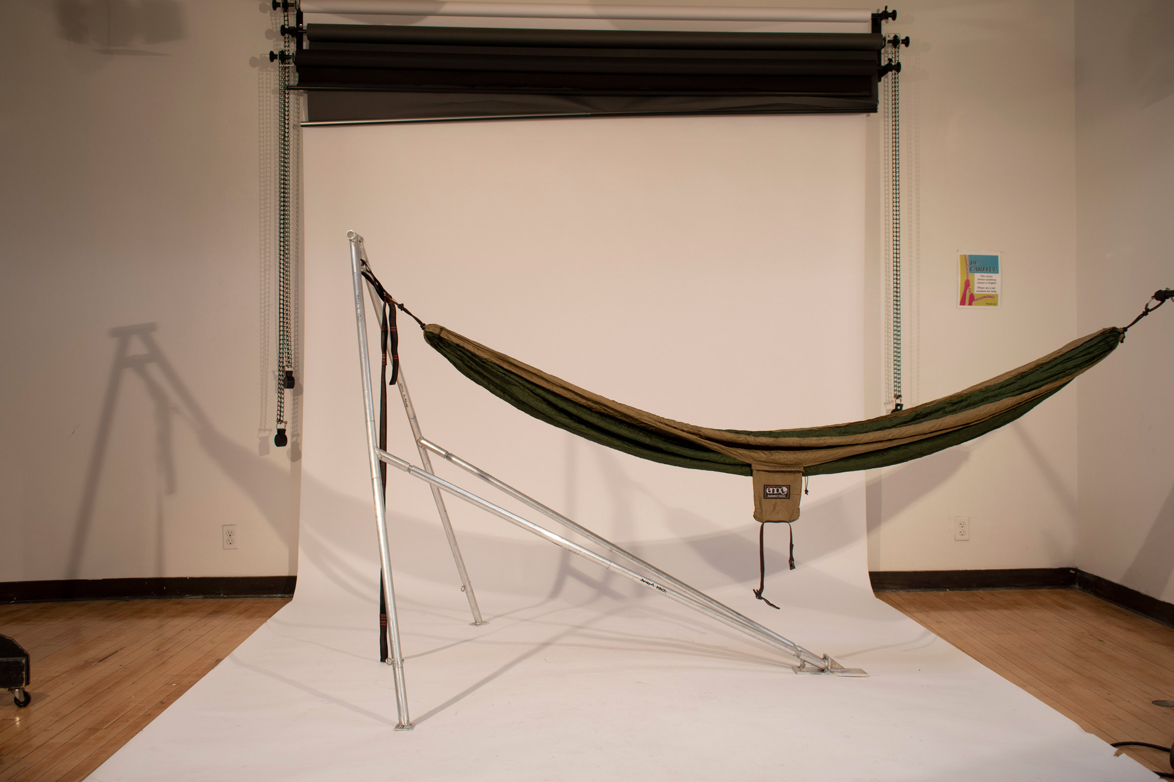 A photograph of a hammock stand by Tyler Dally