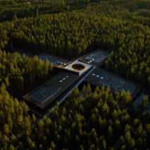 Birde-eye view of The Plus furniture factory by BIG for Vestre in a forest
