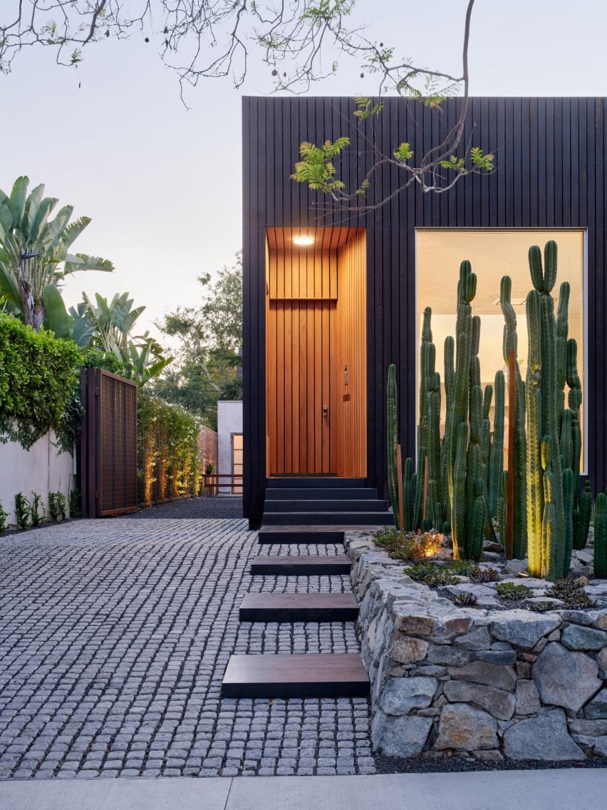 Centered Home entryway with cacti