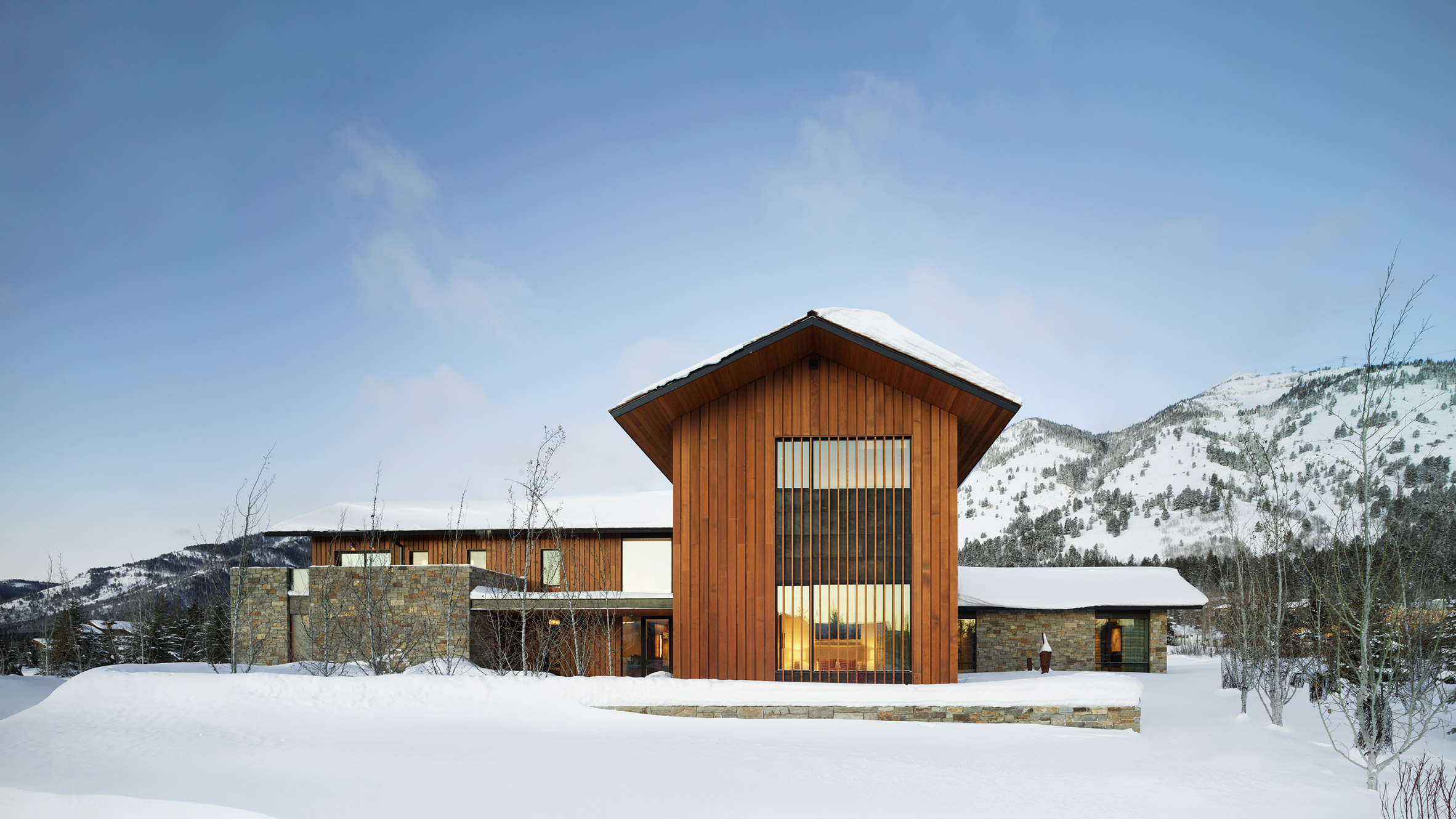 Four Pines is a Wyoming home clad in cedar and local stone