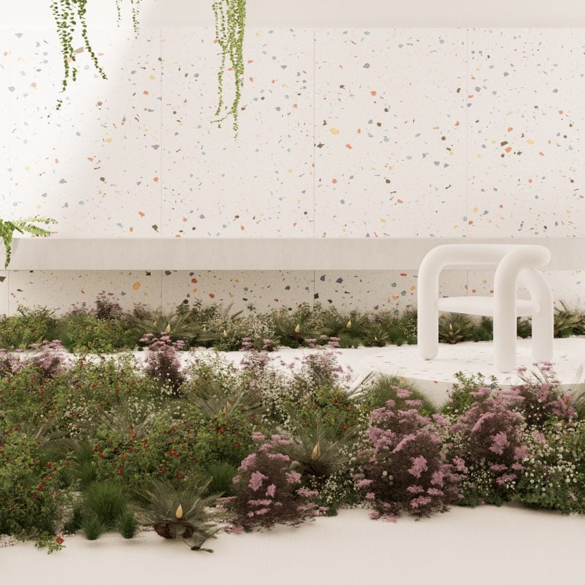 Chair in front of a terrazzo wall with foliage