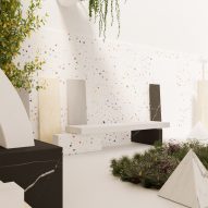 Furniture in front of terrazzo walls with foliage