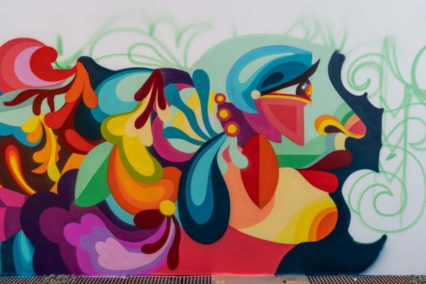 A colourful mural depicting a person's face