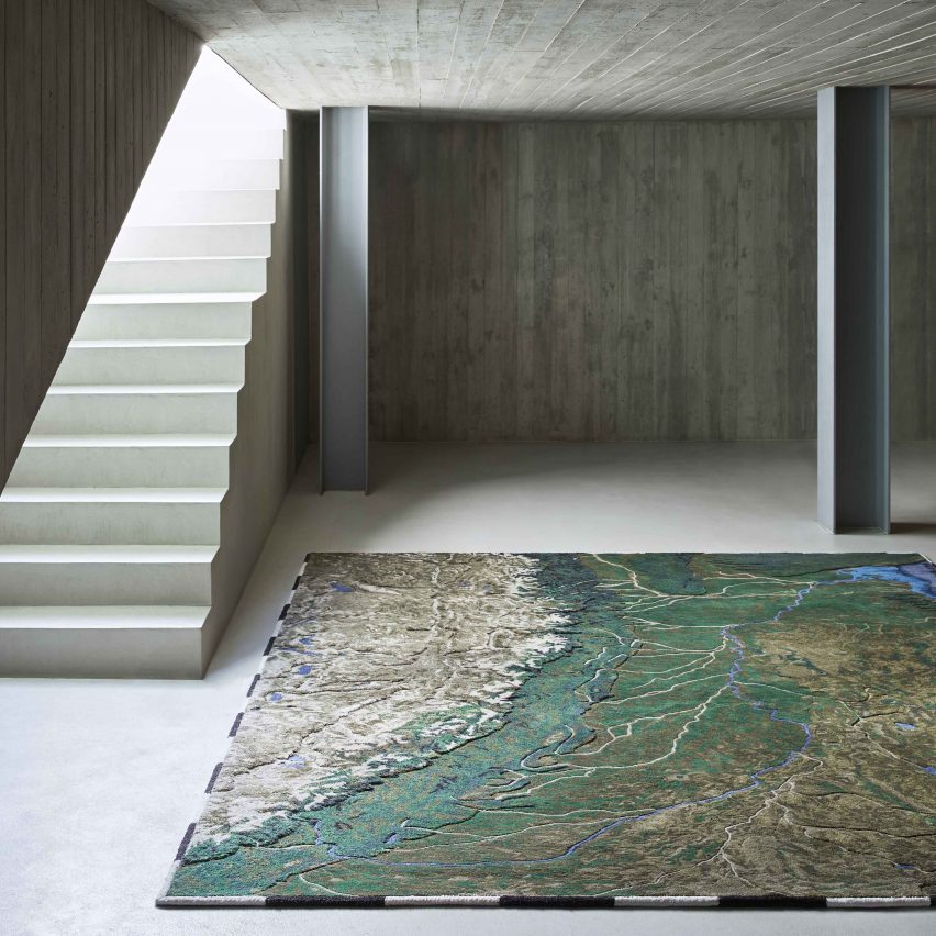 Plastic Rivers rugs by Álvaro Catalán de Ocón for Gan in a concrete room with stairs to the left