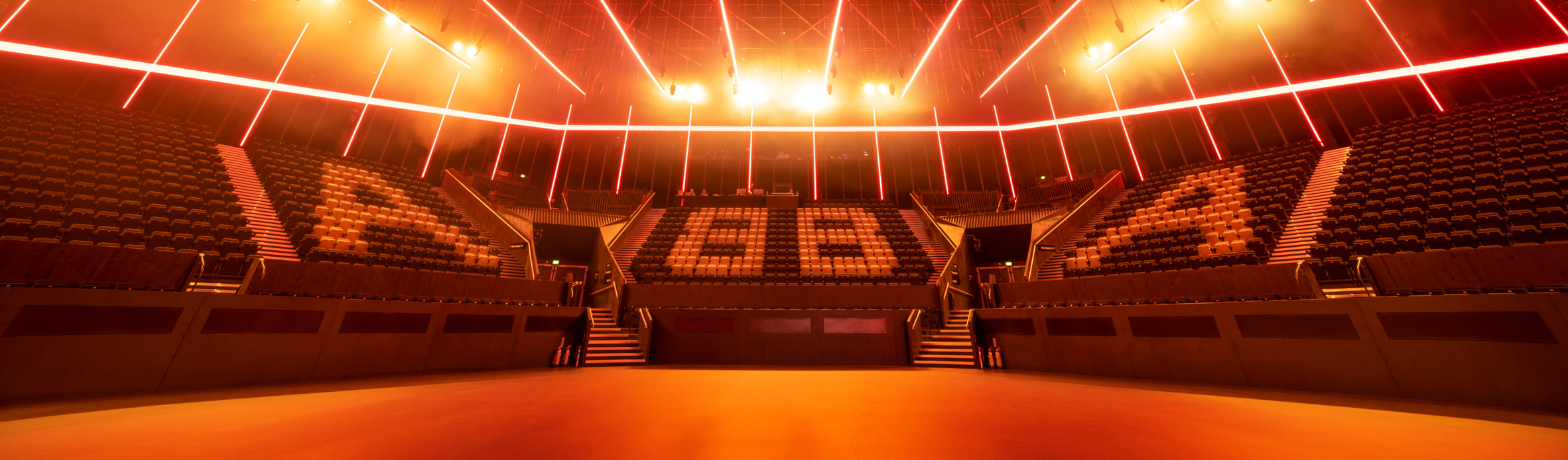 Interior image of ABBA branded audience seating at the venue