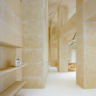 Concrete infrastructure informs Acne Studios' limestone-clad Rue Saint Honoré store