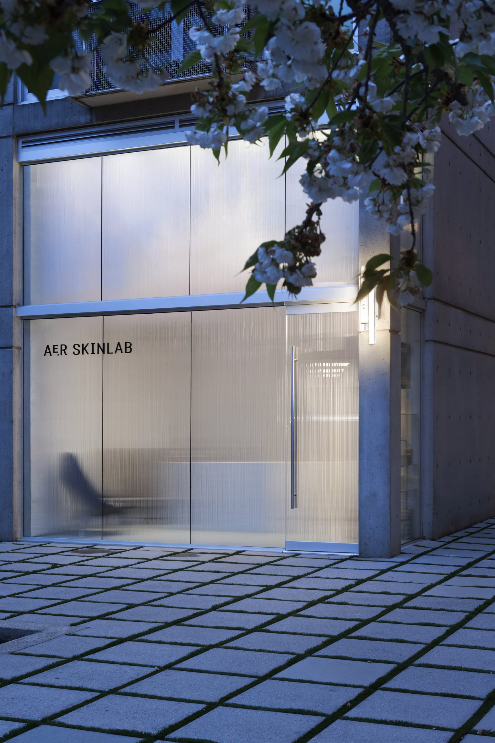 The corrugated glass facade of AER Skinlab in Vancouver, designed by Leckie Studio