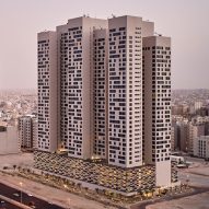 AGi Architects designs Tamdeen Square towers as a "vertical neighbourhood" overlooking the Persian Gulf