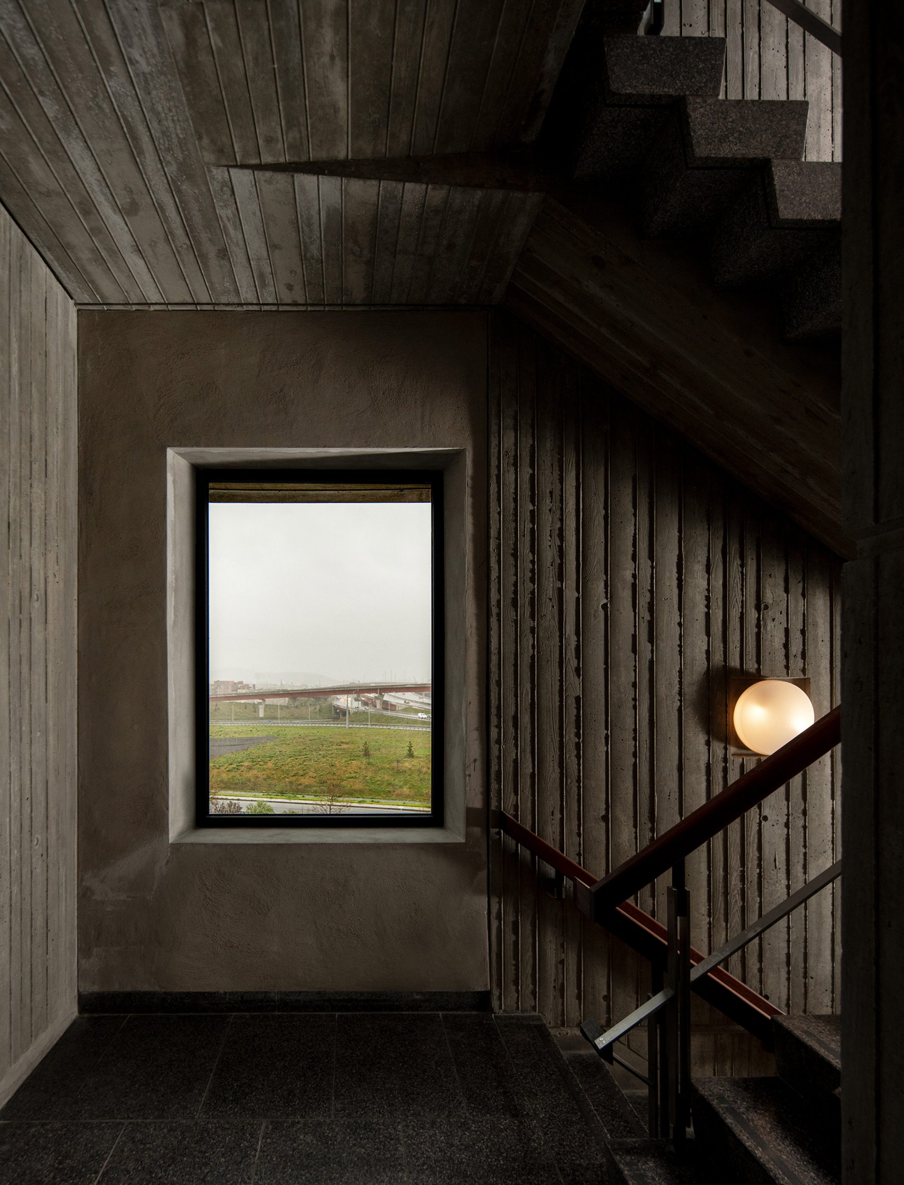 Concrete stairwell with exterior window