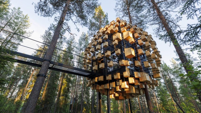 BIG wraps Lapland hotel treehouse in 350 birdhouses