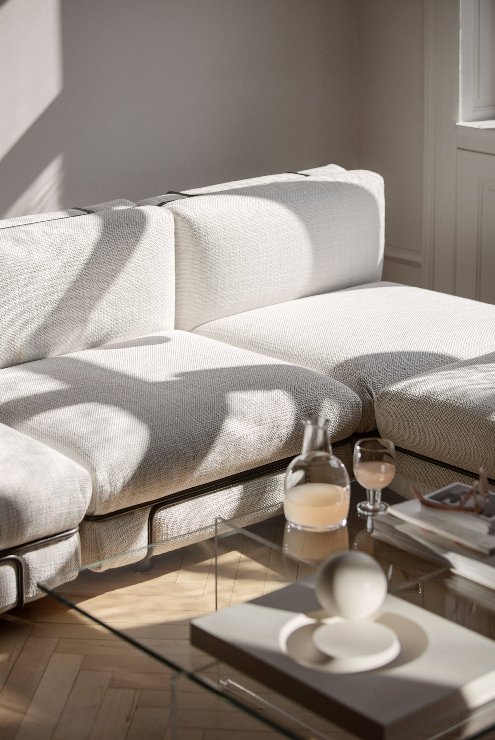White GB lounge chairs by Karakter combined into a sofa arrangement