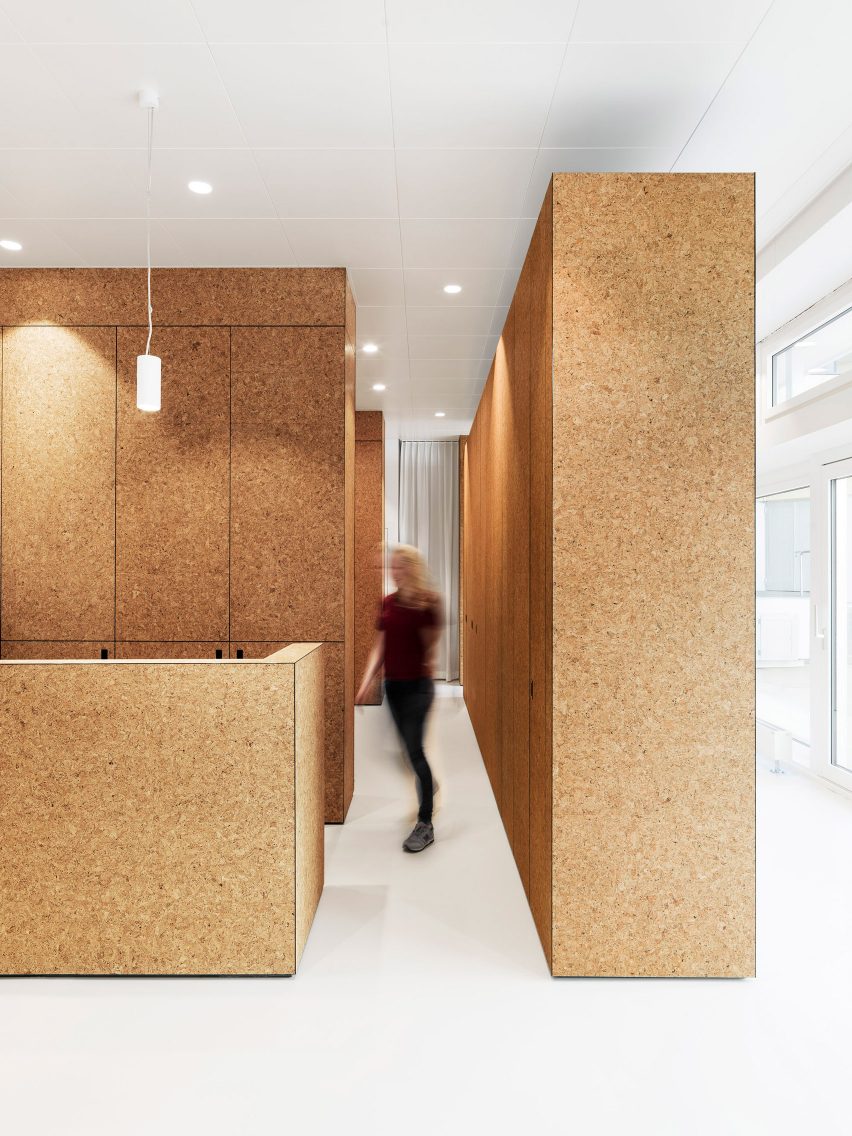 Cork-lined cubicles in Zurich health clinic