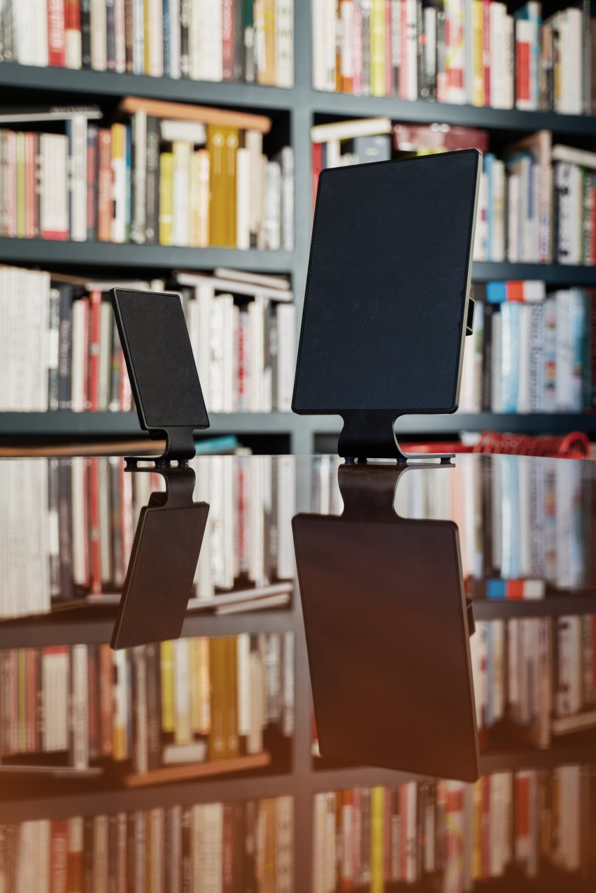 Hidden Sound speakers in front of a bookshelf