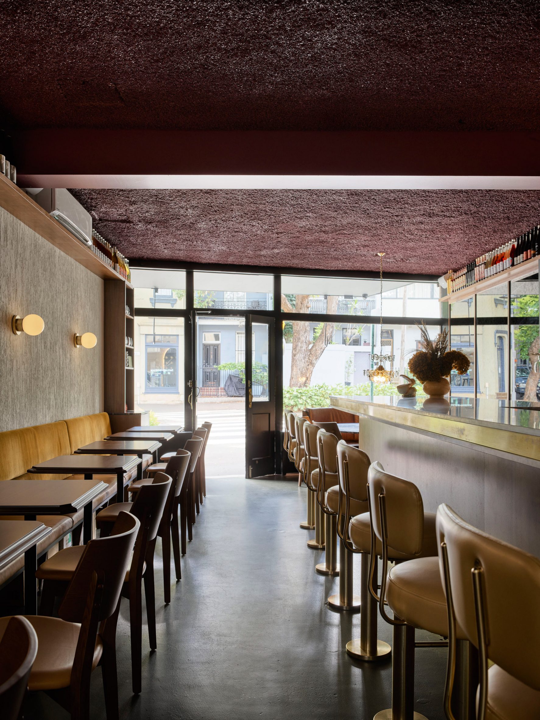 Yellow seating arrangements in bar in Surry Hills, Sydney designed by Luchetti Krelle