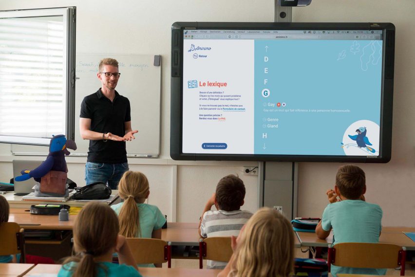 Teacher presenting to a class of children