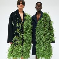 At Loewe Spring Summer 2023, models wear coats in which living plants grow