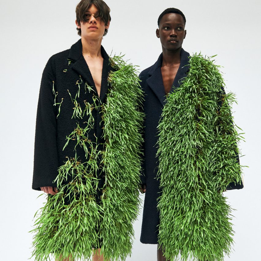 Models wear coats that are growing live plants at Loewe Spring Summer 2023