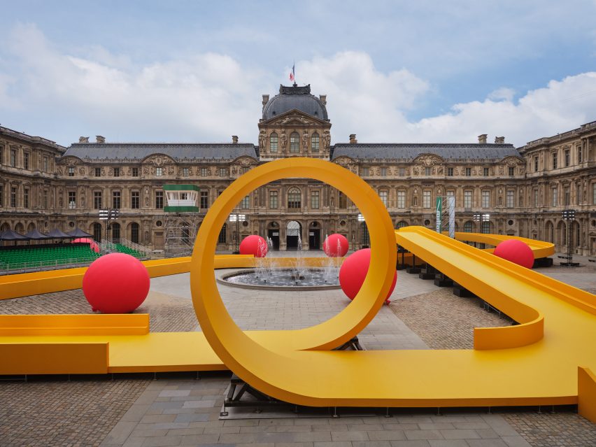 Image of the Louvre courtyard with Louis Vuitton Spring Summer 2023 set
