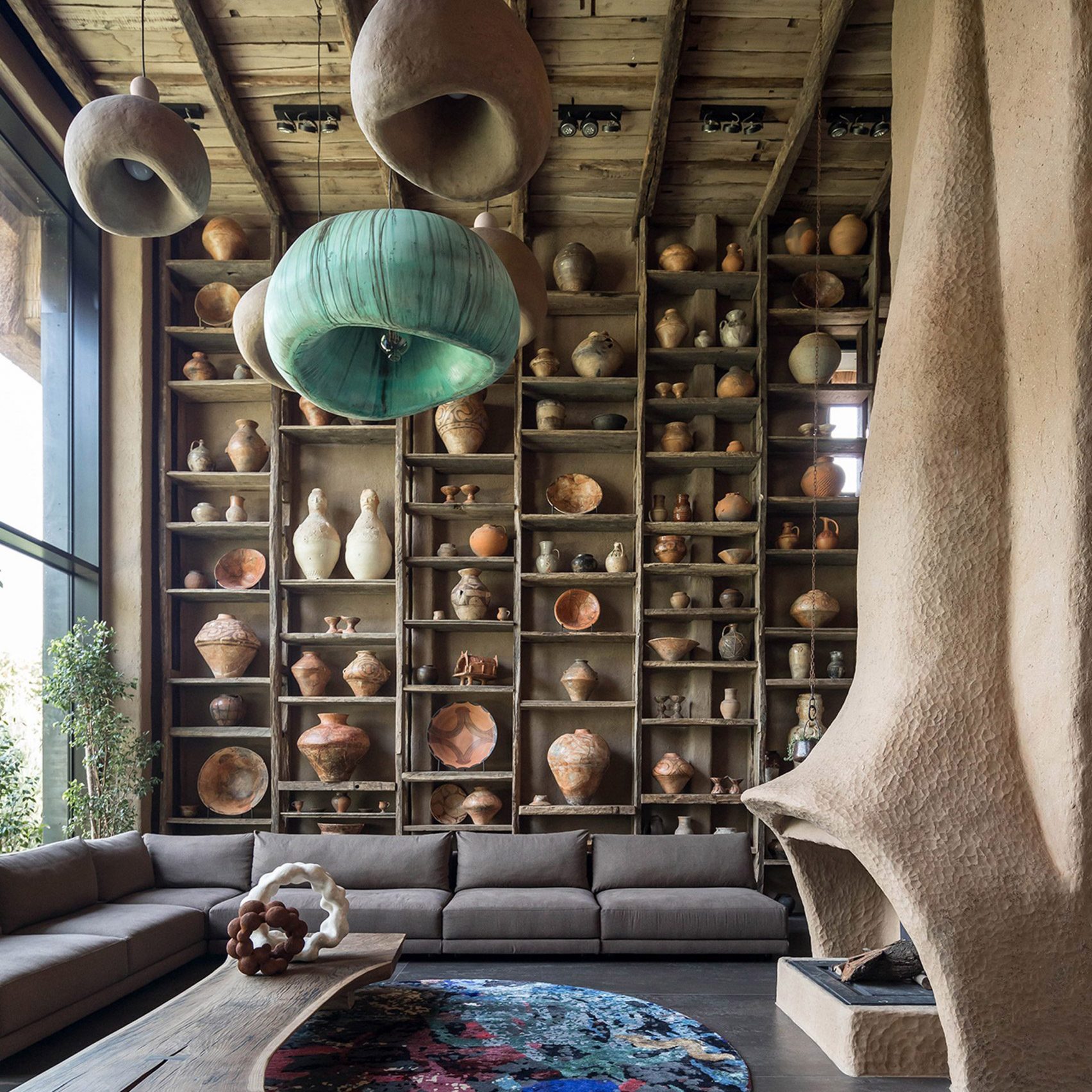 Image of a home with shelving filled with ceramics