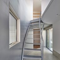 Staircase within Scenery Scooping House by Not Architects Studio
