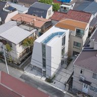 Not Architects Studio creates Japanese house with void to "scoop up" views