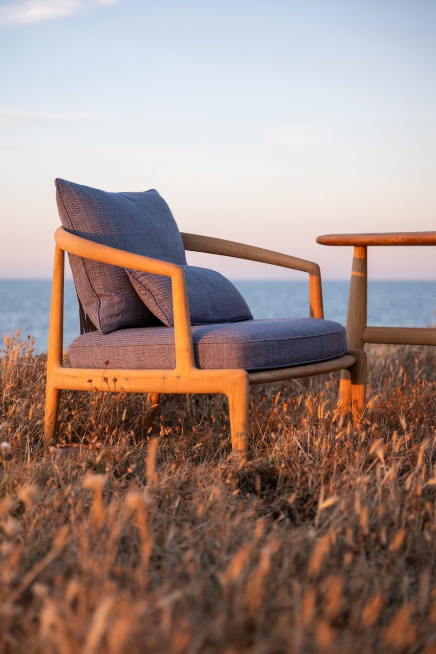 A wooden armchair on a beach