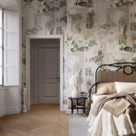 Bedroom with floral wall-covering