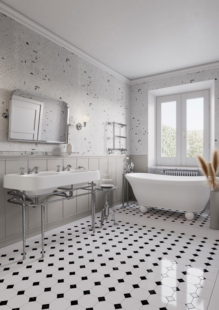 View of a bathroom with black and white floor tiles
