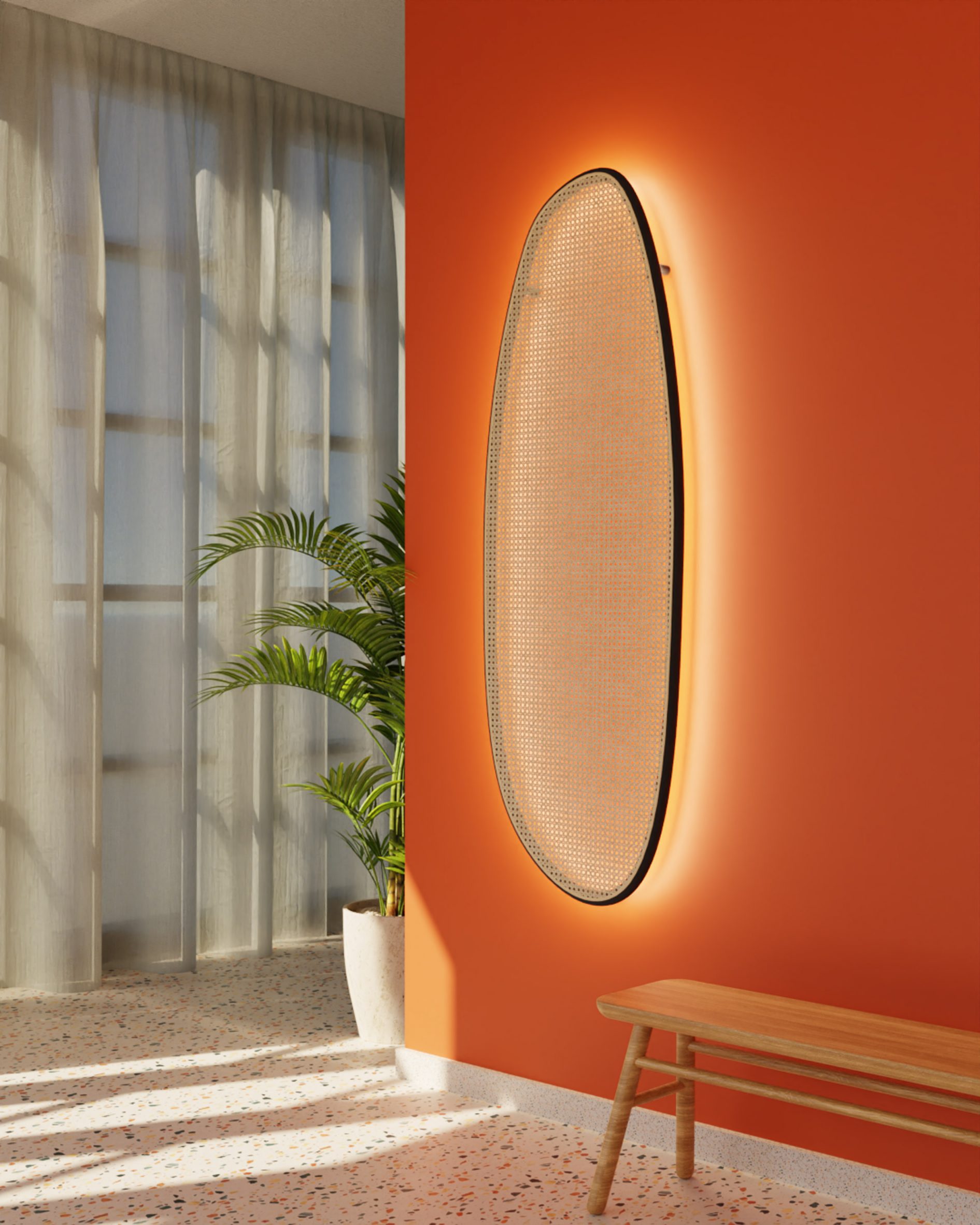 Long Sisu lamp with rattan front on an orange wall in a hallway