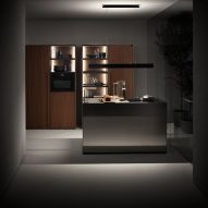Dark kitchen with units by Falper